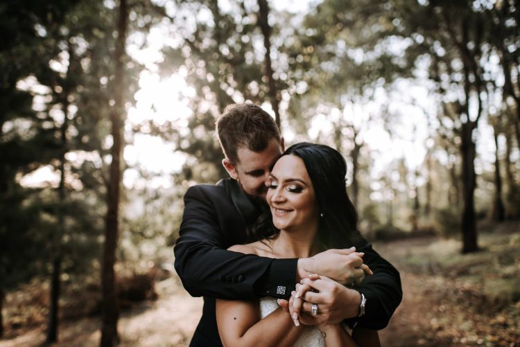 Perth bride and groom at sunset amongst trees